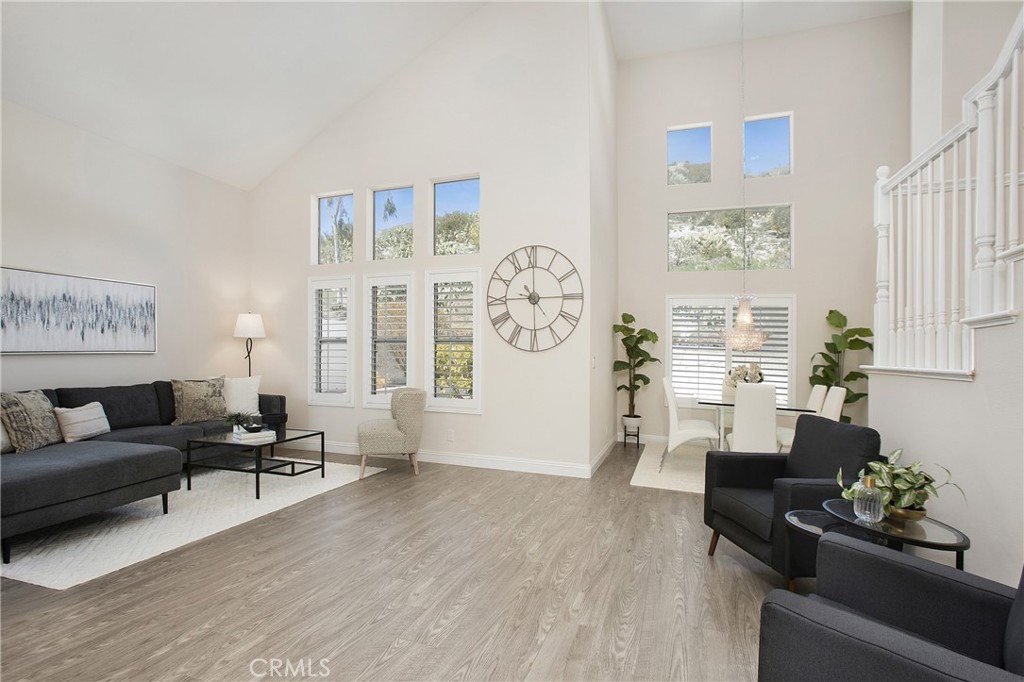 17 Calle Cabrillo Lake Forest, CA 92610 - Photo 3 of 44 a living room with furniture and a large window