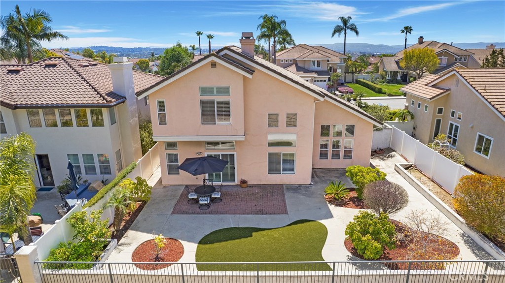 17 Calle Cabrillo Lake Forest, CA 92610 - Photo 31 of 44 a front view of a house with garden