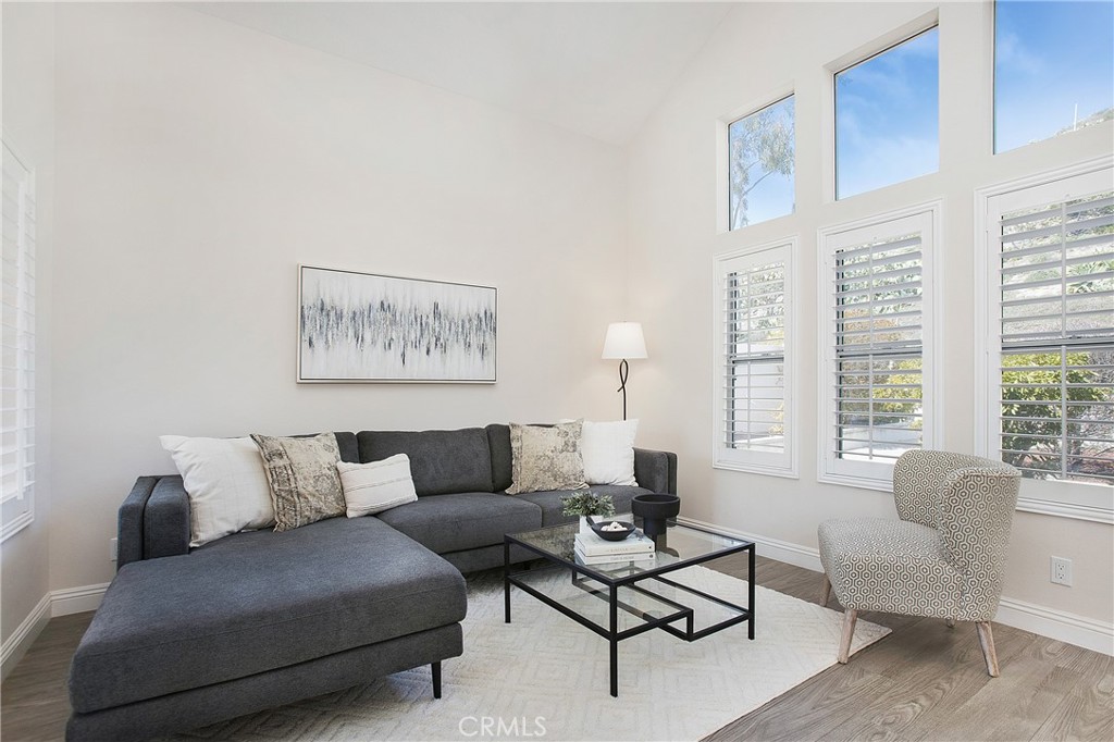 17 Calle Cabrillo Lake Forest, CA 92610 - Photo 6 of 44 a living room with furniture and a large window