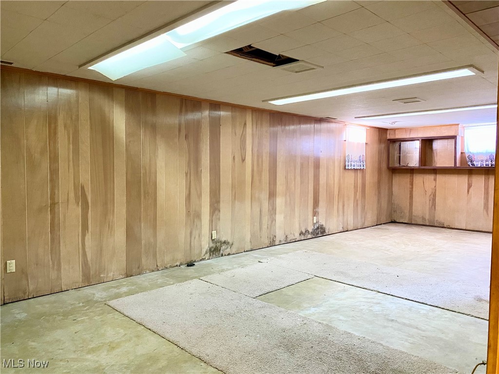 1034 Straub Road West Mansfield, OH 44904 - Photo 22 of 27 Basement with wooden walls
