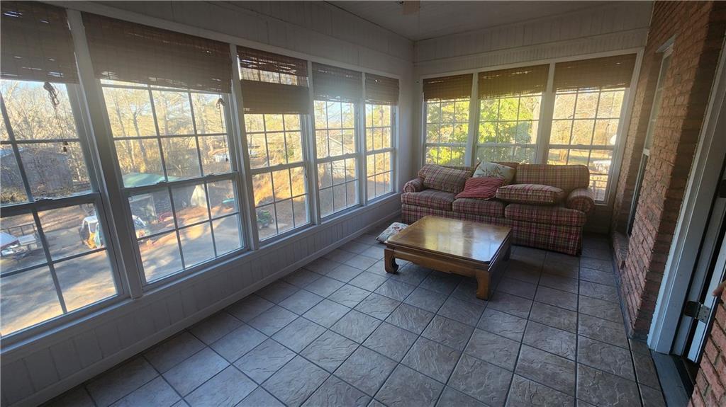 1 North Kenora Drive Southwest Rome, GA 30165 - Photo 18 of 24 a living room with furniture and a large window