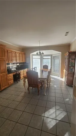 a view of a livingroom with furniture and window