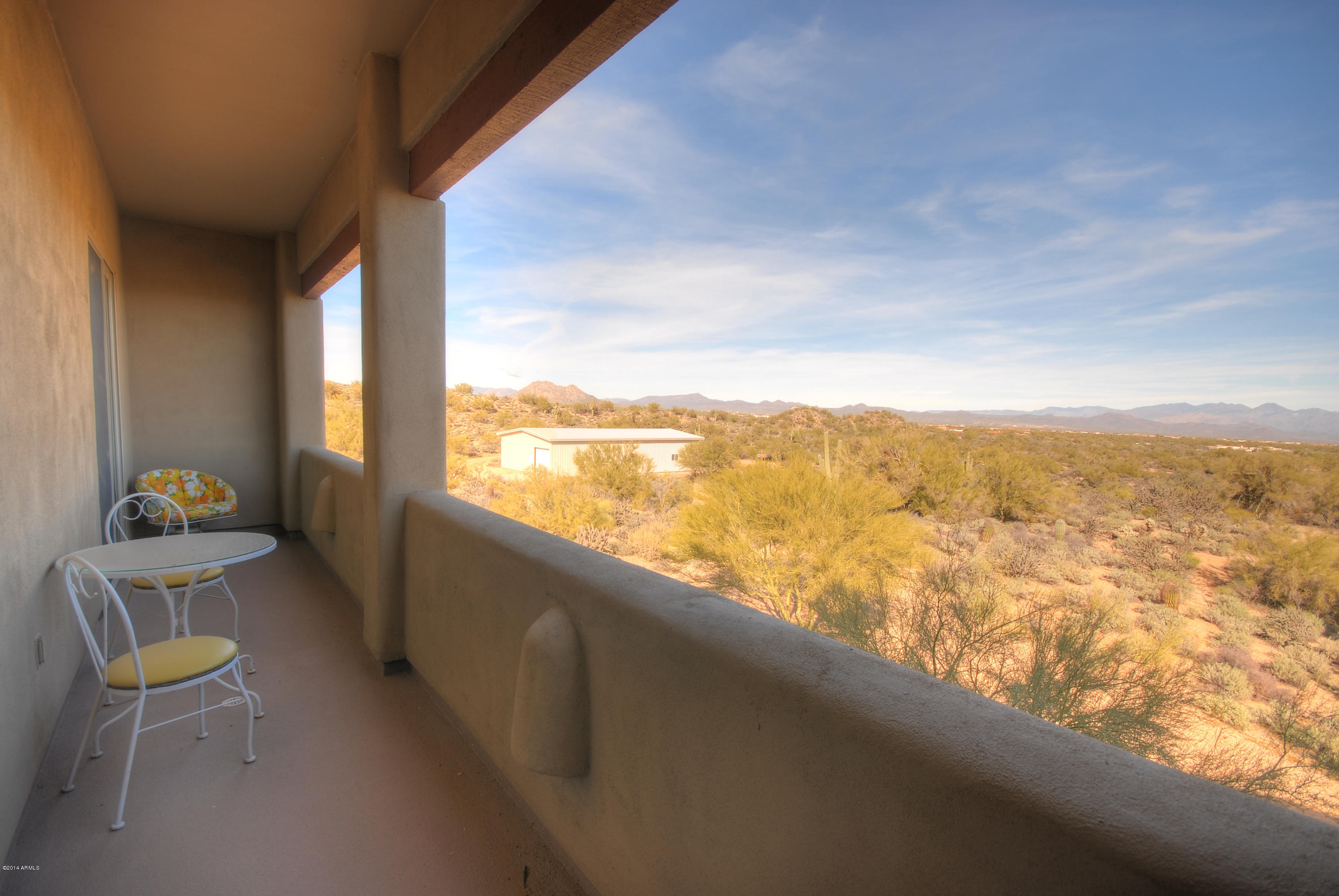 13502 East Jomax Road Scottsdale, AZ 85262 - Photo 24 of 50 a view of a city from a balcony