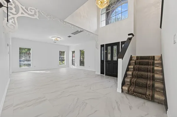 a view of an entryway with staircase