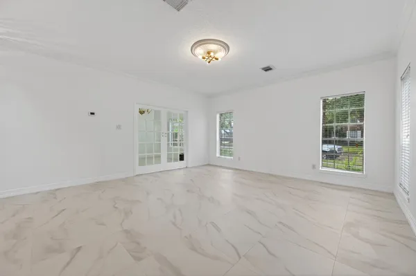 an empty room with windows