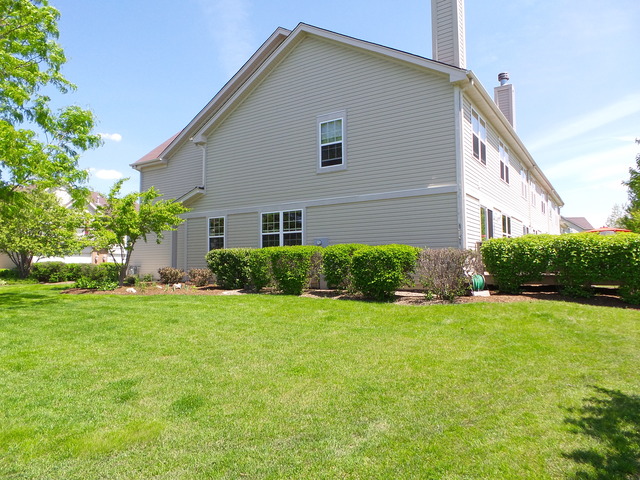 3129 Raphael Court St. Charles, IL 60175 - Photo 2 of 17 front view of a house with a yard
