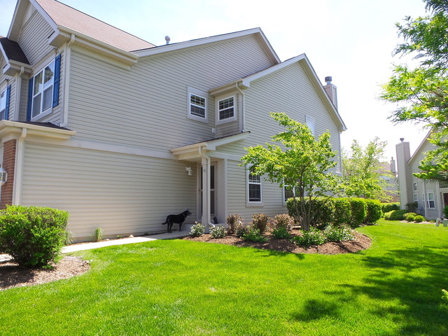 3129 Raphael Court St. Charles, IL 60175 - Photo 3 of 17 a front view of house with yard and green space