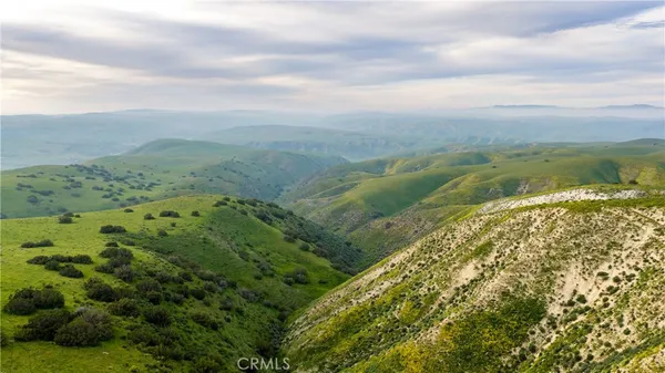 a view of a lake with a city