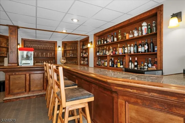 a view of a chairs and table in a room