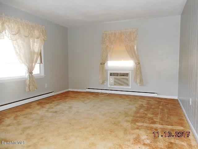184 Washington Mountain Road Lee, MA 01238 - Photo 2 of 26 a view of an empty room with a window