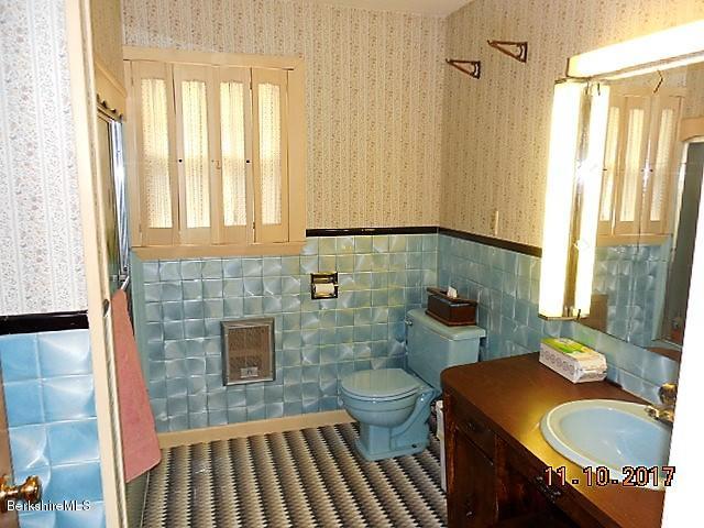 184 Washington Mountain Road Lee, MA 01238 - Photo 15 of 26 a bathroom with a sink toilet and shower