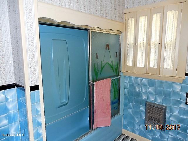 184 Washington Mountain Road Lee, MA 01238 - Photo 16 of 26 a bathroom with a sink and a mirror