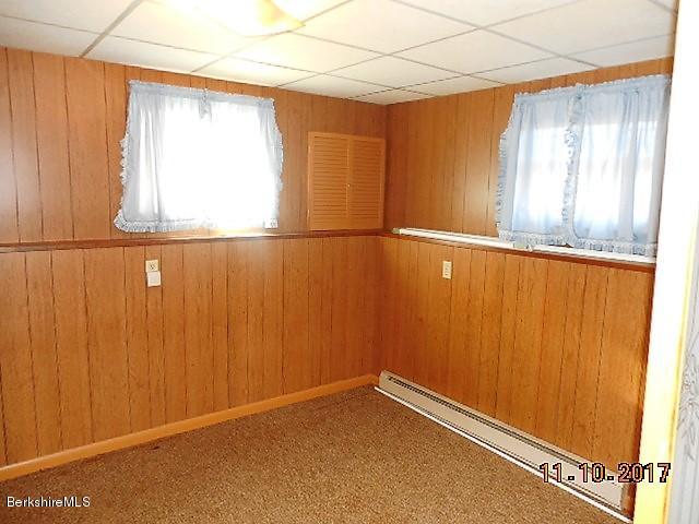 184 Washington Mountain Road Lee, MA 01238 - Photo 20 of 26 a view of an empty room with a window