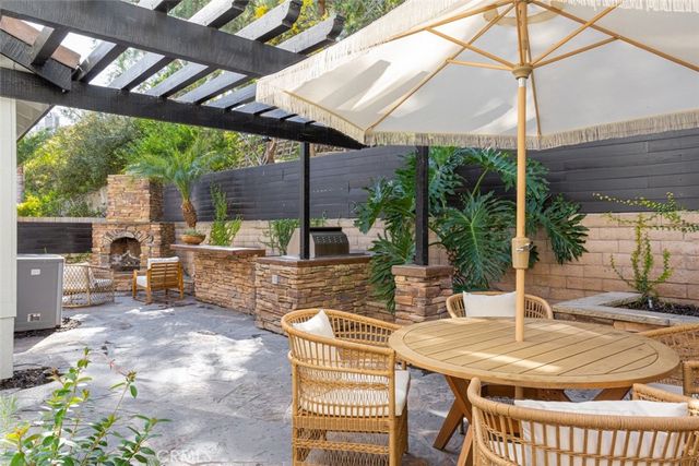 front view of house with a potted plant