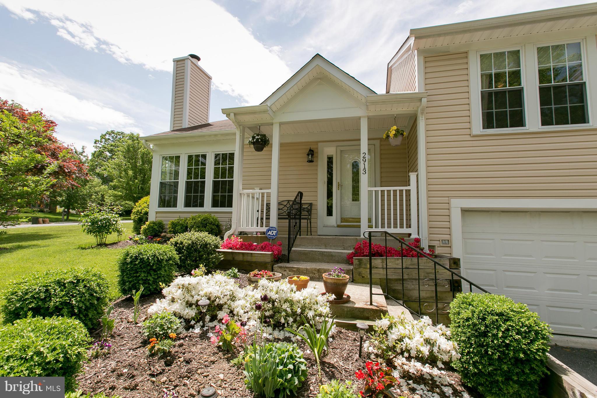 2913 Memory Lane Silver Spring, MD 20904 - Photo 3 of 28 a front view of a house with garden