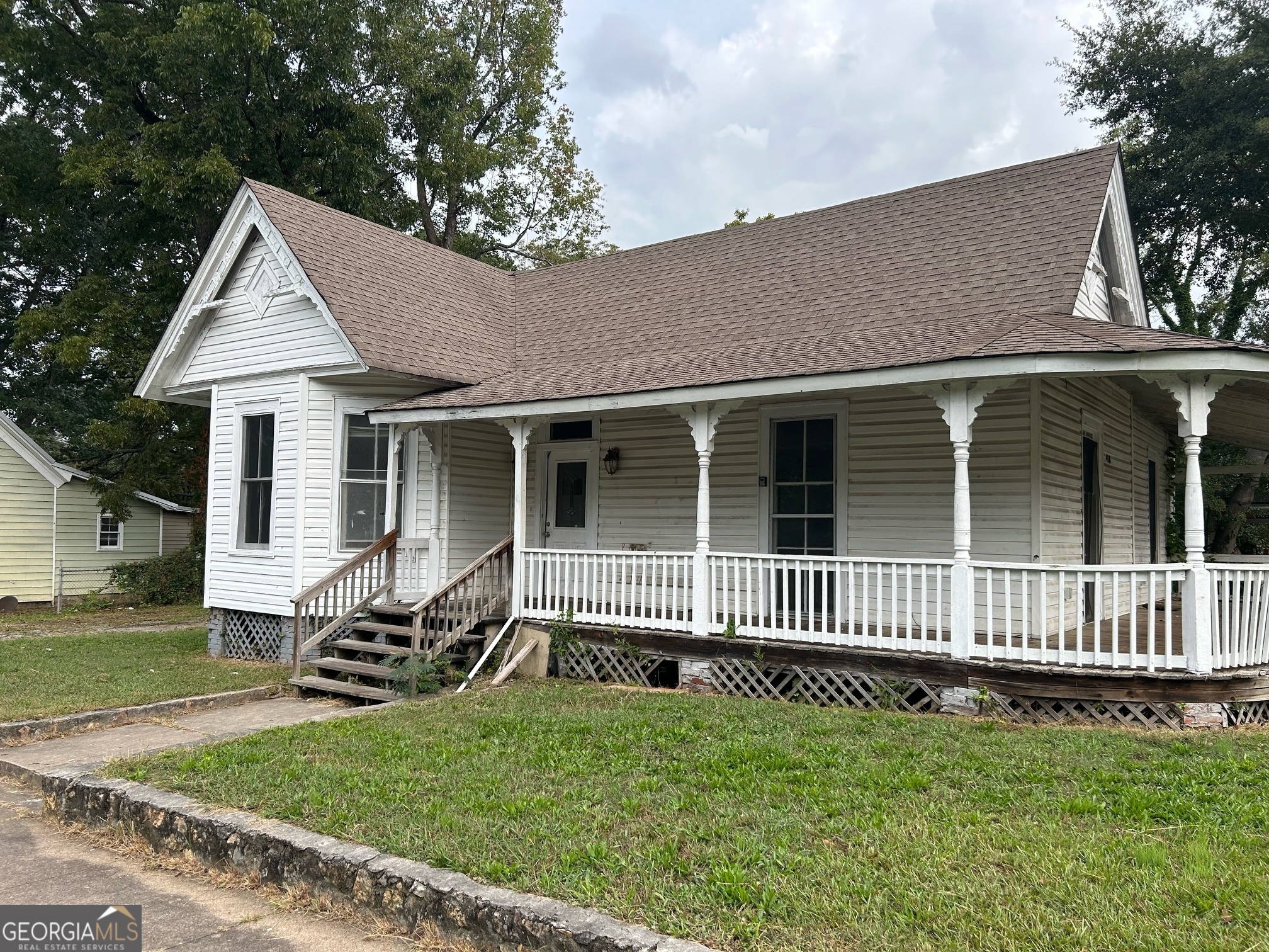 418 Harper Avenue Southwest Rome, GA 30161 - Photo 1 of 1 a house view with a garden space