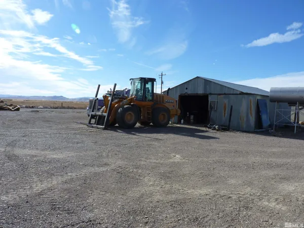 a view of a lake with a yard