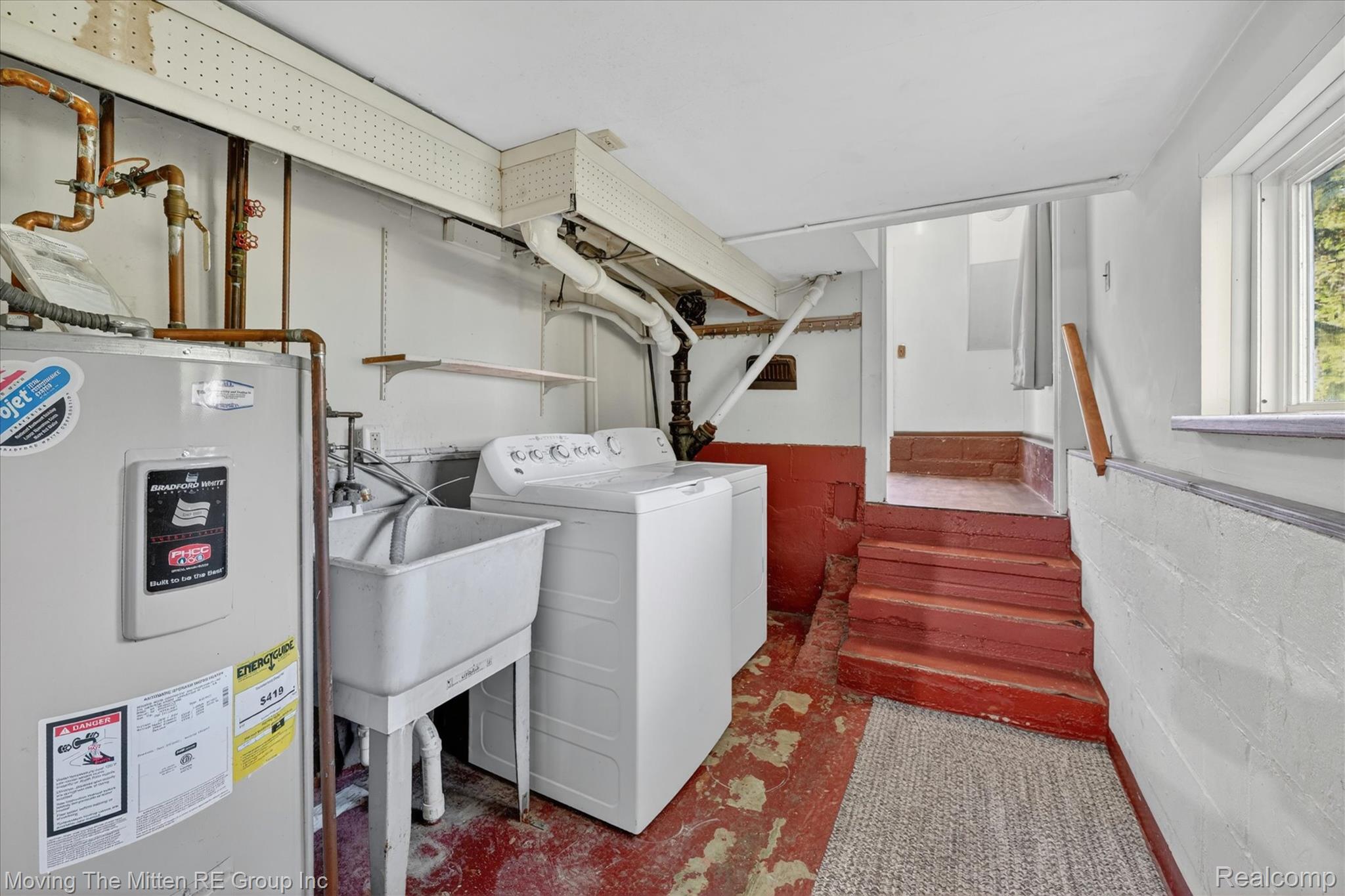 25505 Wick Road Taylor, MI 48180 - Photo 35 of 68 Laundry area with water heater