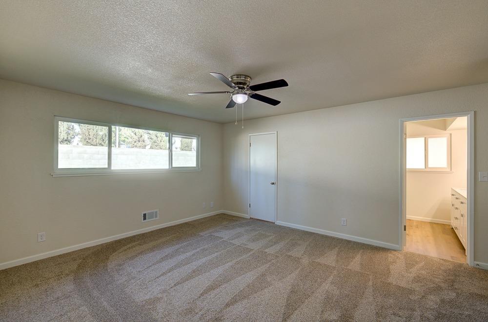 351 North Peach Avenue Clovis, CA 93612 - Photo 16 of 34 a view of an empty room with a window