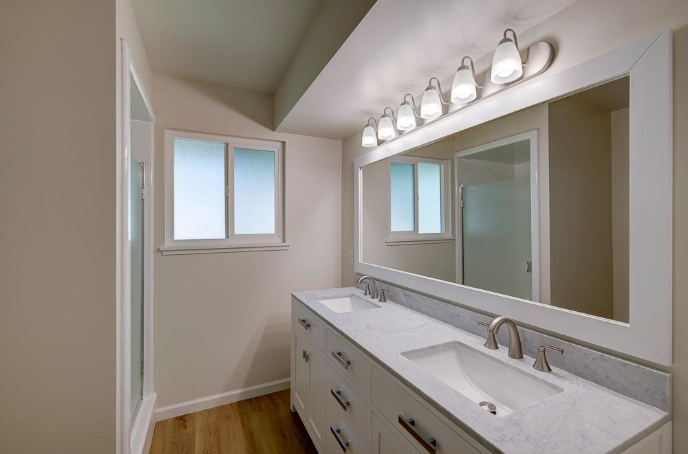 351 North Peach Avenue Clovis, CA 93612 - Photo 18 of 34 a bathroom with a sink vanity and a mirror