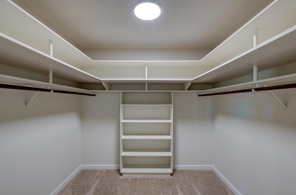 351 North Peach Avenue Clovis, CA 93612 - Photo 19 of 34 a view of walk in closet with empty racks