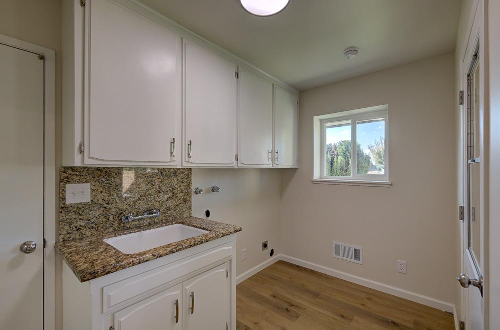351 North Peach Avenue Clovis, CA 93612 - Photo 25 of 34 a view of a sink and cabinets