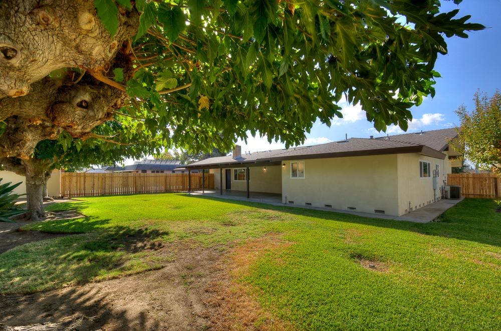 351 North Peach Avenue Clovis, CA 93612 - Photo 27 of 34 a view of a backyard with a small cabin