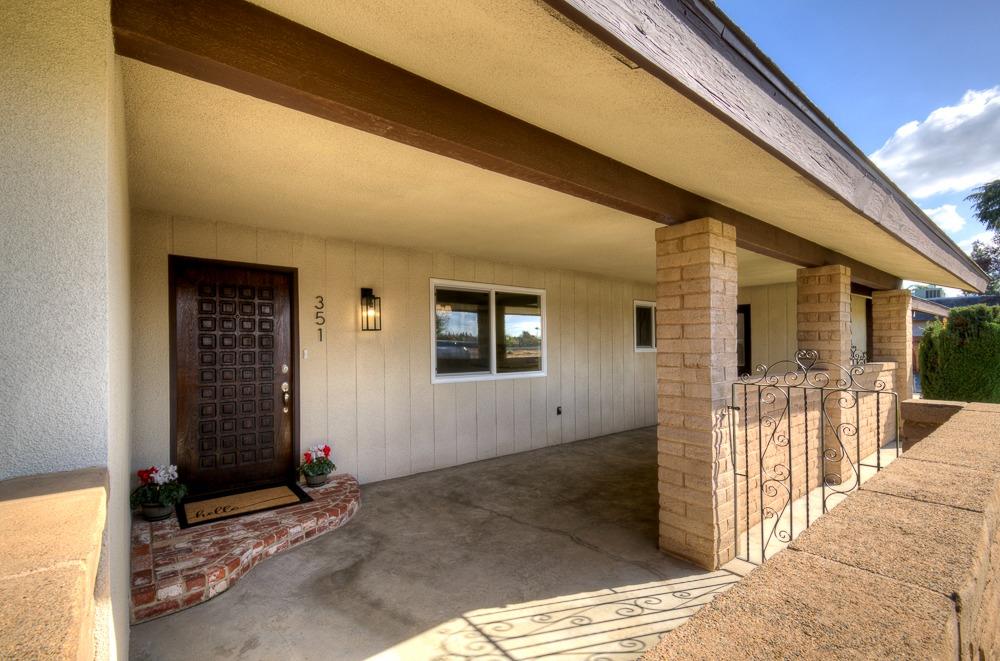 351 North Peach Avenue Clovis, CA 93612 - Photo 3 of 34 a view of a house with a patio
