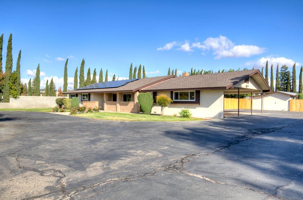 351 North Peach Avenue Clovis, CA 93612 - Photo 34 of 34 a view of an house with backyard and a kitchen