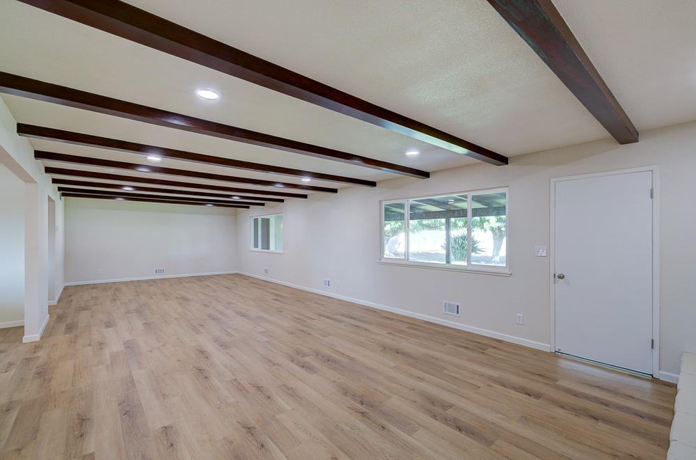 351 North Peach Avenue Clovis, CA 93612 - Photo 7 of 34 a view of empty room with wooden floor