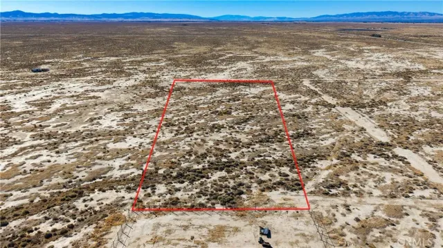 a view of ocean and a mountain