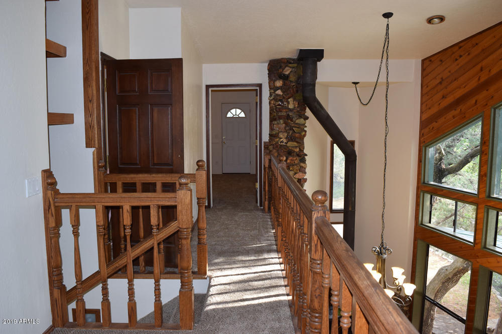 979 Beaver Flat Road Payson, AZ 85541 - Photo 36 of 70 Upstairs hall to bedroom 2