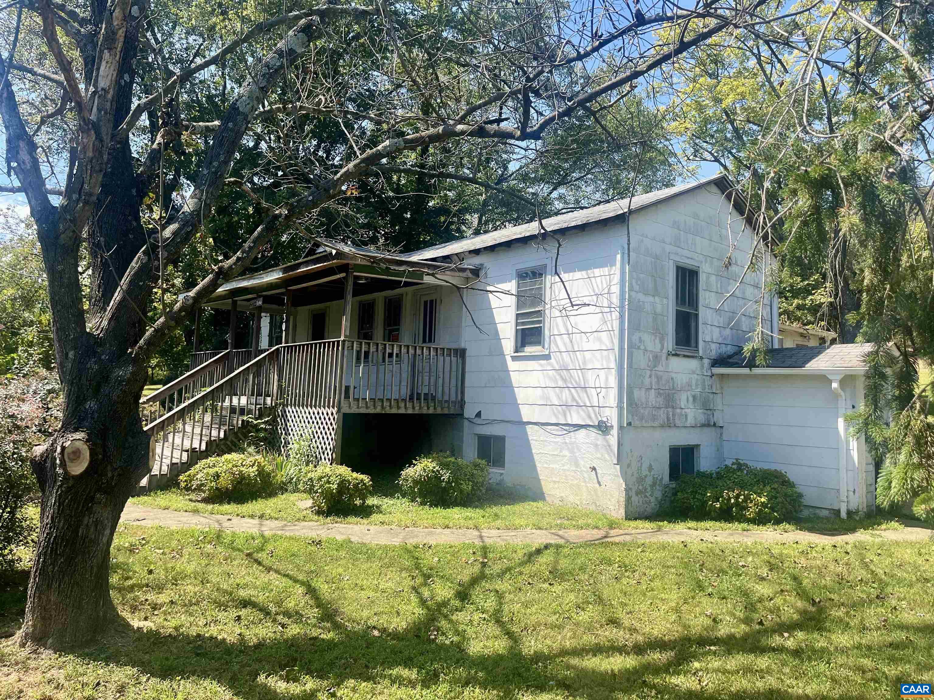 1630 Buck Road Crozet, VA 22932 - Photo 3 of 30 a front view of a house with a yard