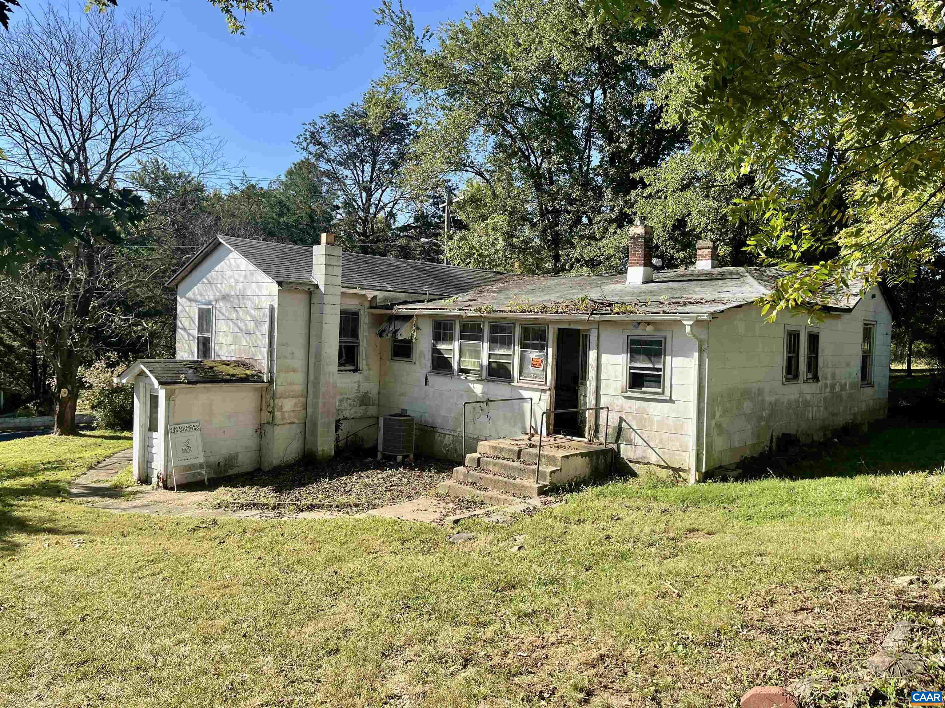 1630 Buck Road Crozet, VA 22932 - Photo 5 of 30 a front view of a house with a yard