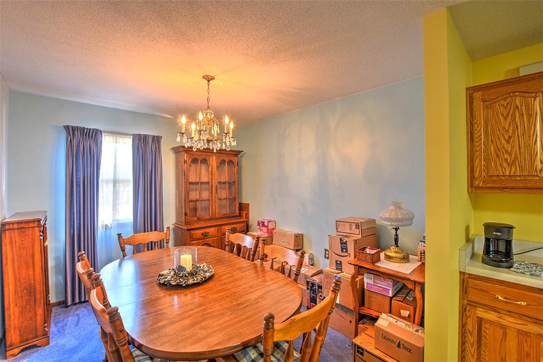 3055 Long Creek Road Decatur, IL 62521 - Photo 14 of 29 a dining room with furniture and wooden floor