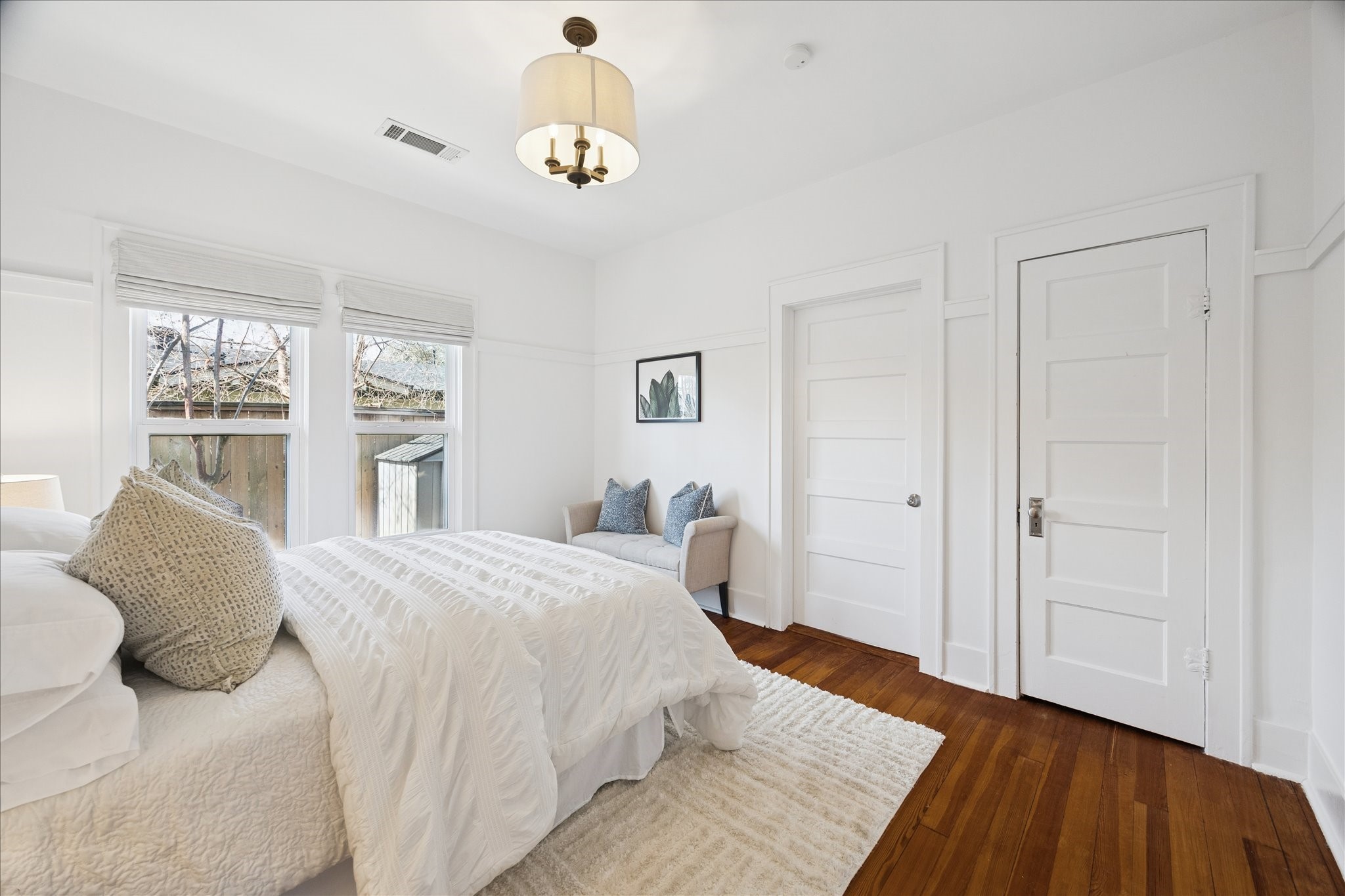 623 Pecore Street Houston, TX 77009 - Photo 22 of 34 Secondary bedroom with closet storage and space for a queen bed.