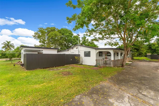 front view of a house with a big yard