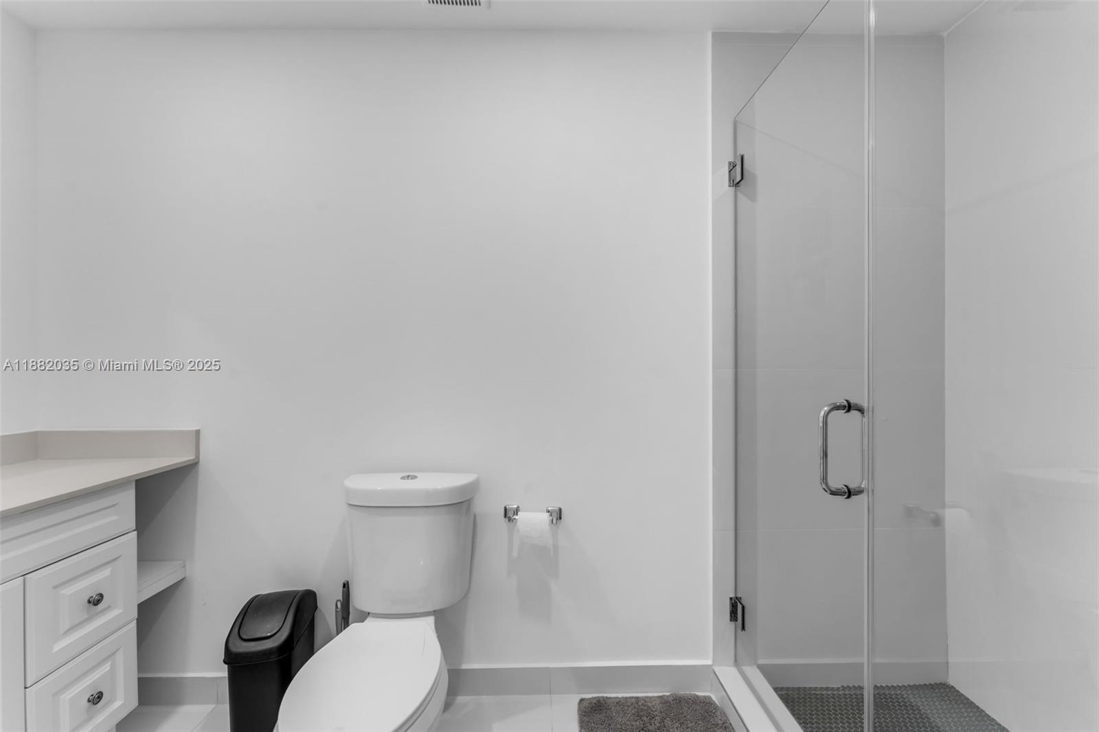 12750 Southwest 197th Avenue Miami, FL 33196 - Photo 21 of 60 a white toilet sitting next to a bathroom sink