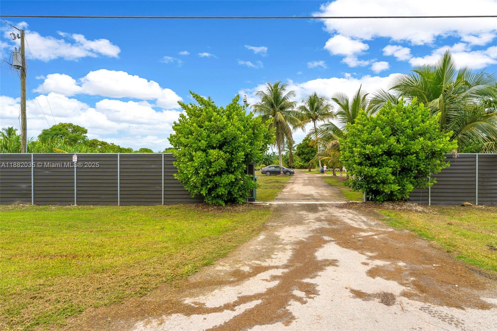 12750 Southwest 197th Avenue Miami, FL 33196 - Photo 55 of 60 a view of a yard with an empty space