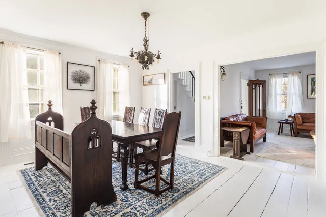 a view of a dining room with furniture