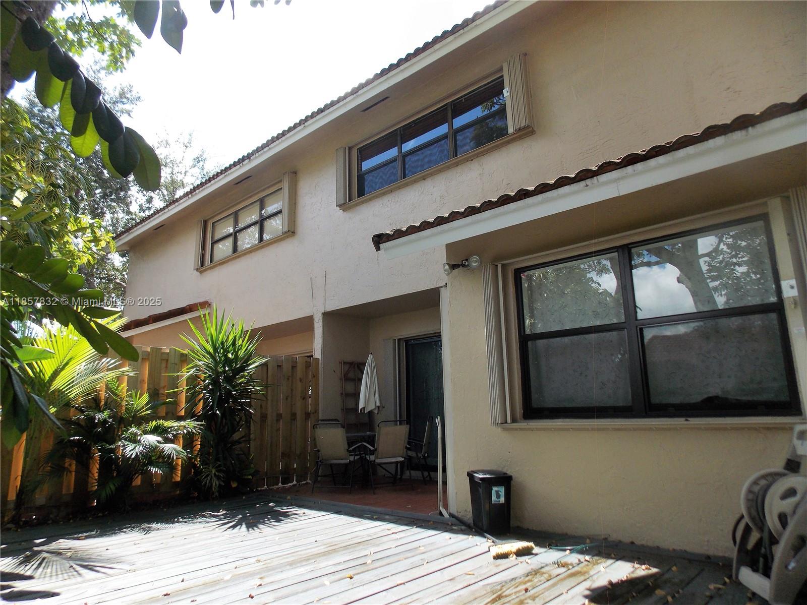 8906 Southwest 113th Pl Circle East Miami, FL 33176 - Photo 12 of 15 a view of a house with a balcony