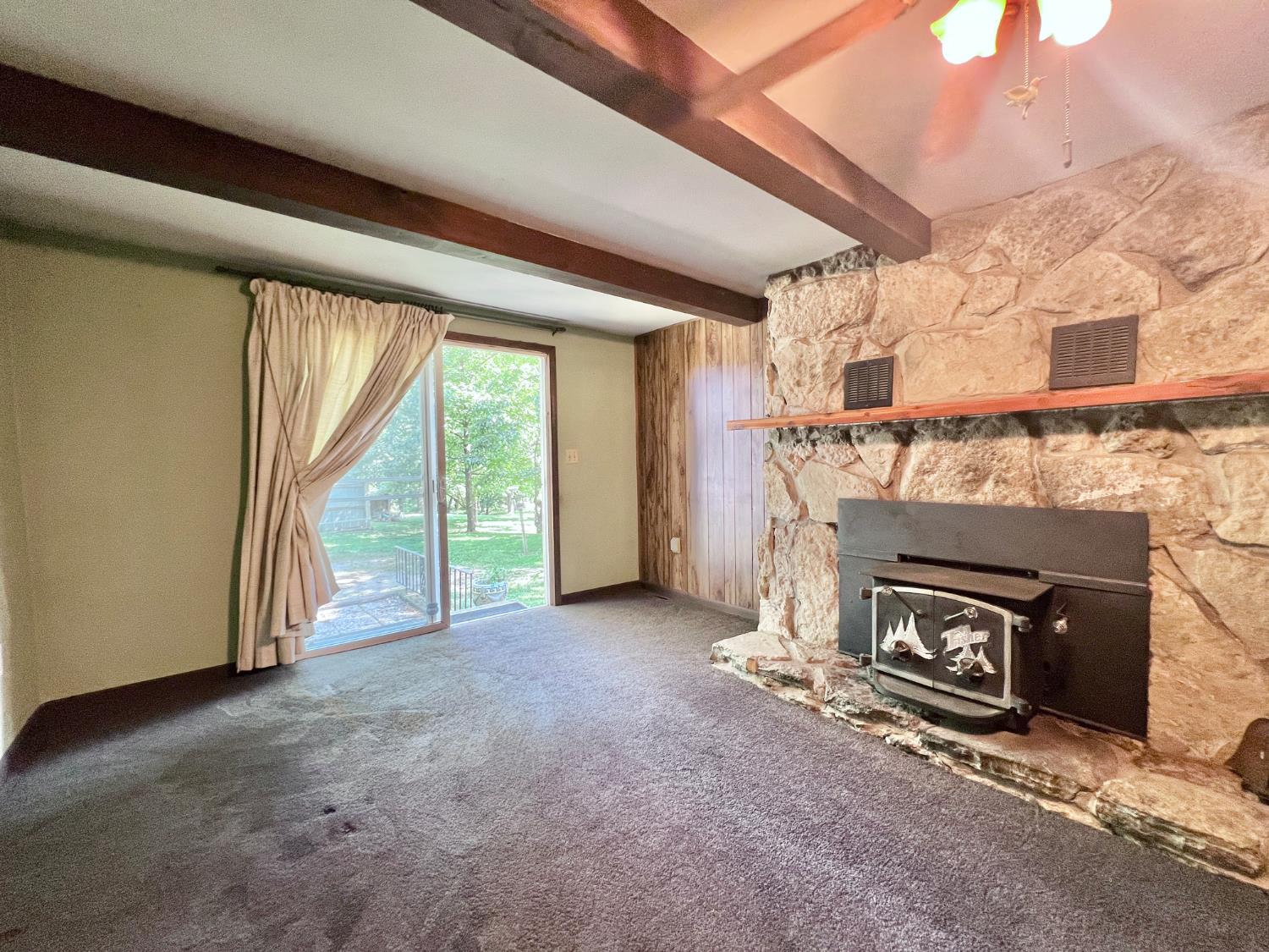 2654 Green Valley Road Vevay, IN 47043 - Photo 30 of 48 Family Room with Wood Insert and Beamed Ceiling