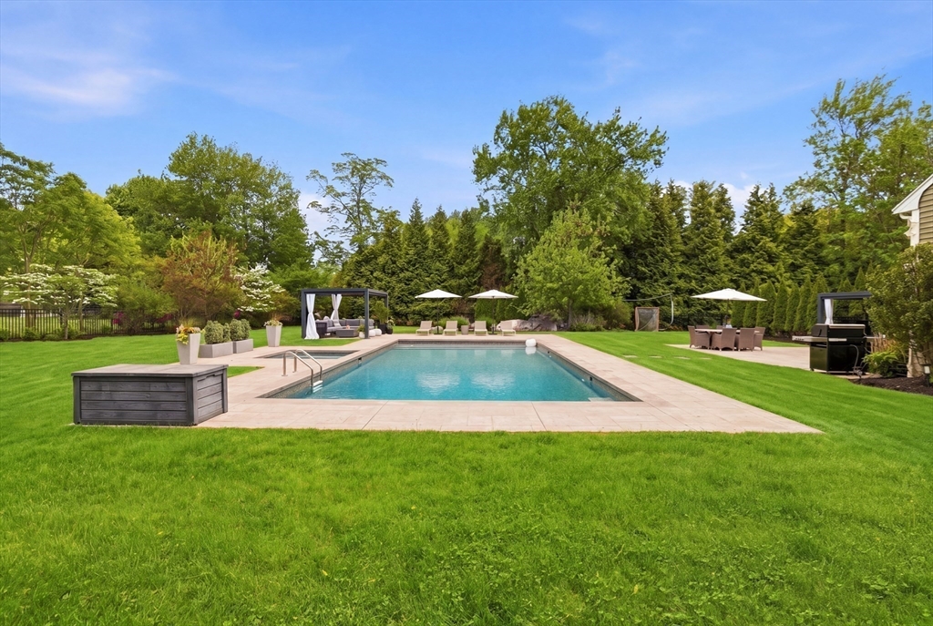 85 Old Farm Road Milton, MA 02186 - Photo 36 of 42 a view of yard with swimming pool and green space