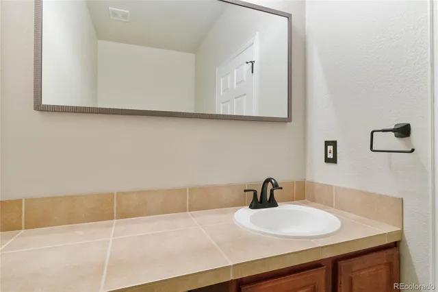 a view of a street with a building in the background