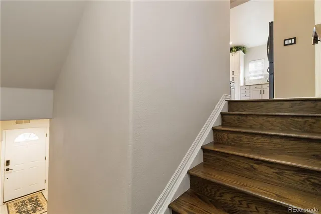 a kitchen with granite countertop a stove and center island