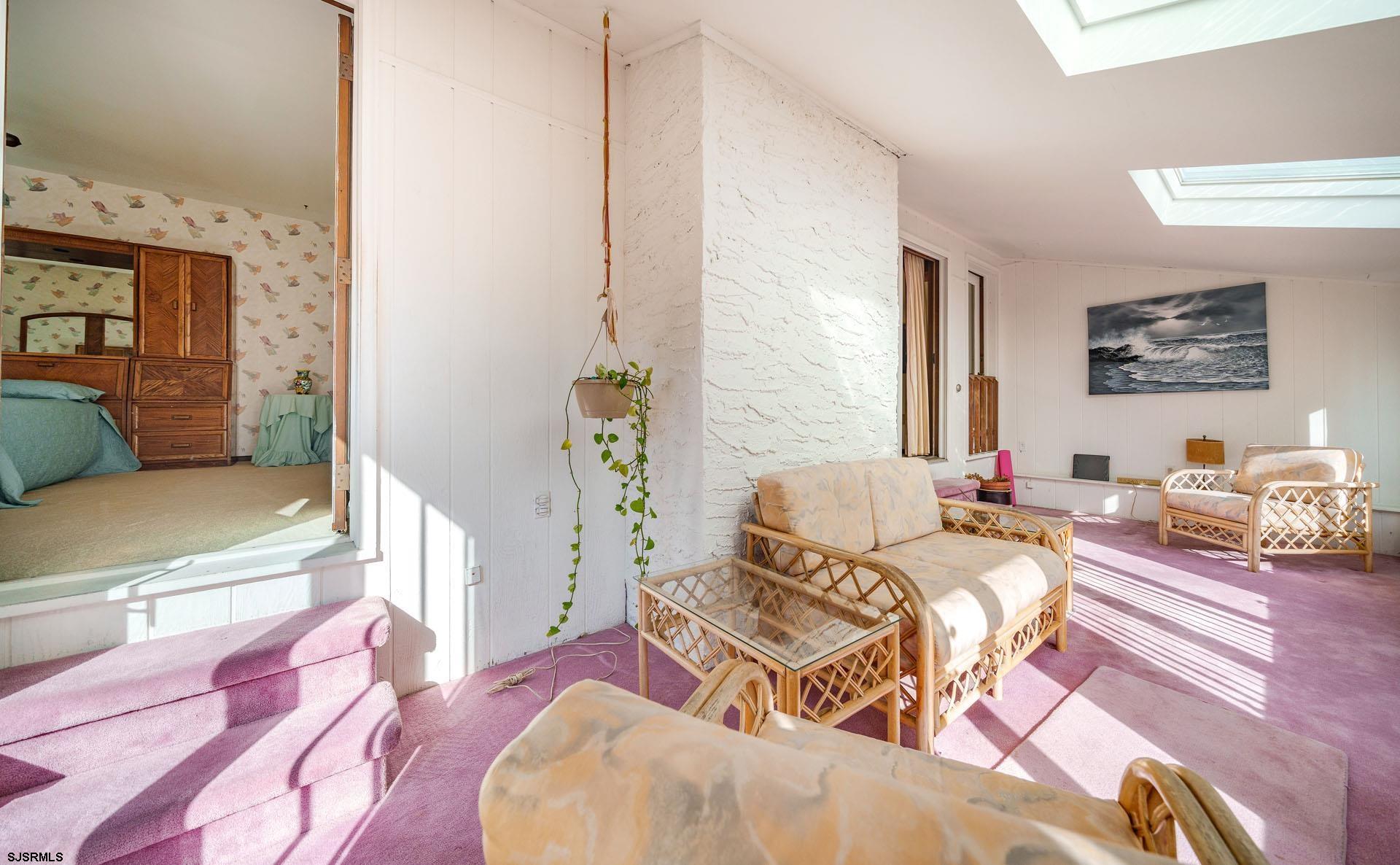 601 2nd Avenue Marmora, NJ 08223 - Photo 12 of 31 a bedroom with furniture and a couch