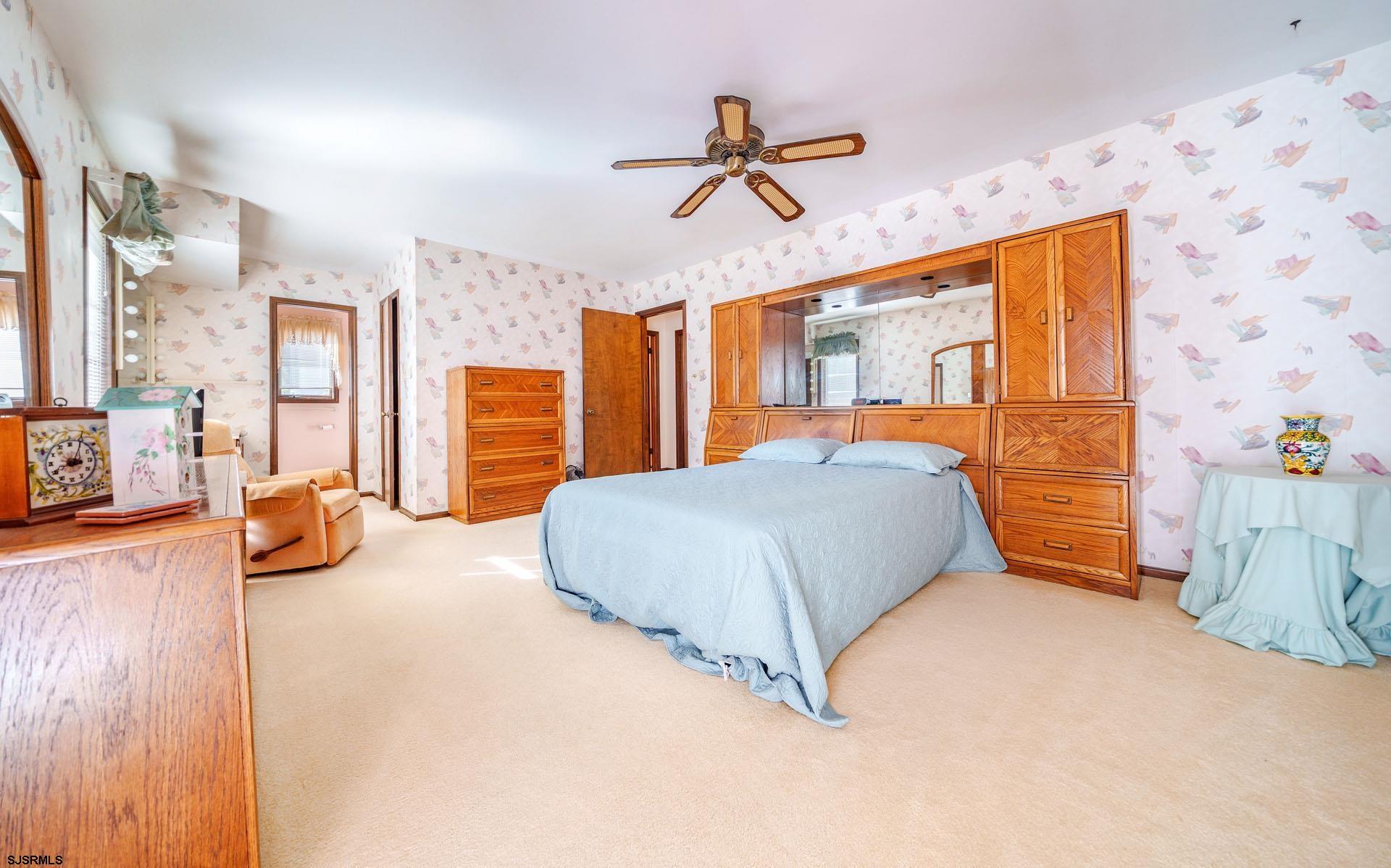 601 2nd Avenue Marmora, NJ 08223 - Photo 14 of 31 a bedroom with a bed and window