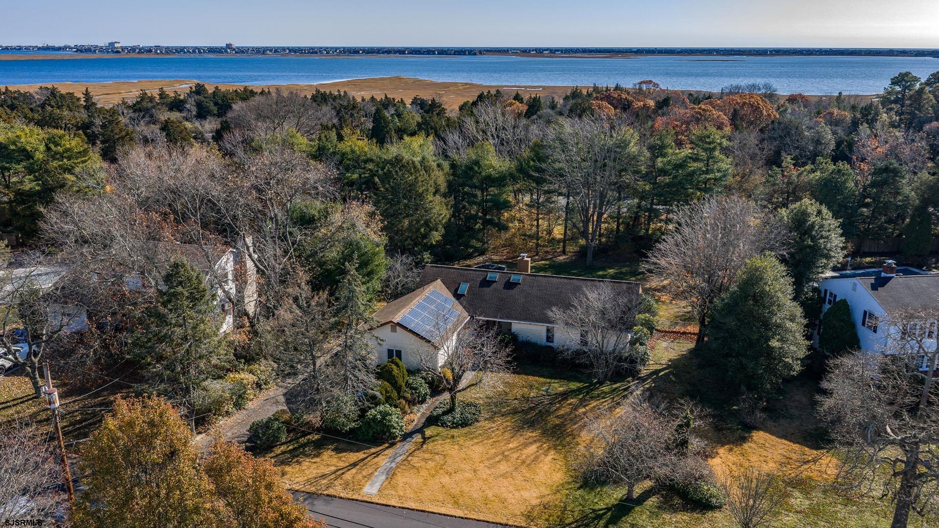 601 2nd Avenue Marmora, NJ 08223 - Photo 2 of 31 a view of a house with a yard and lake view