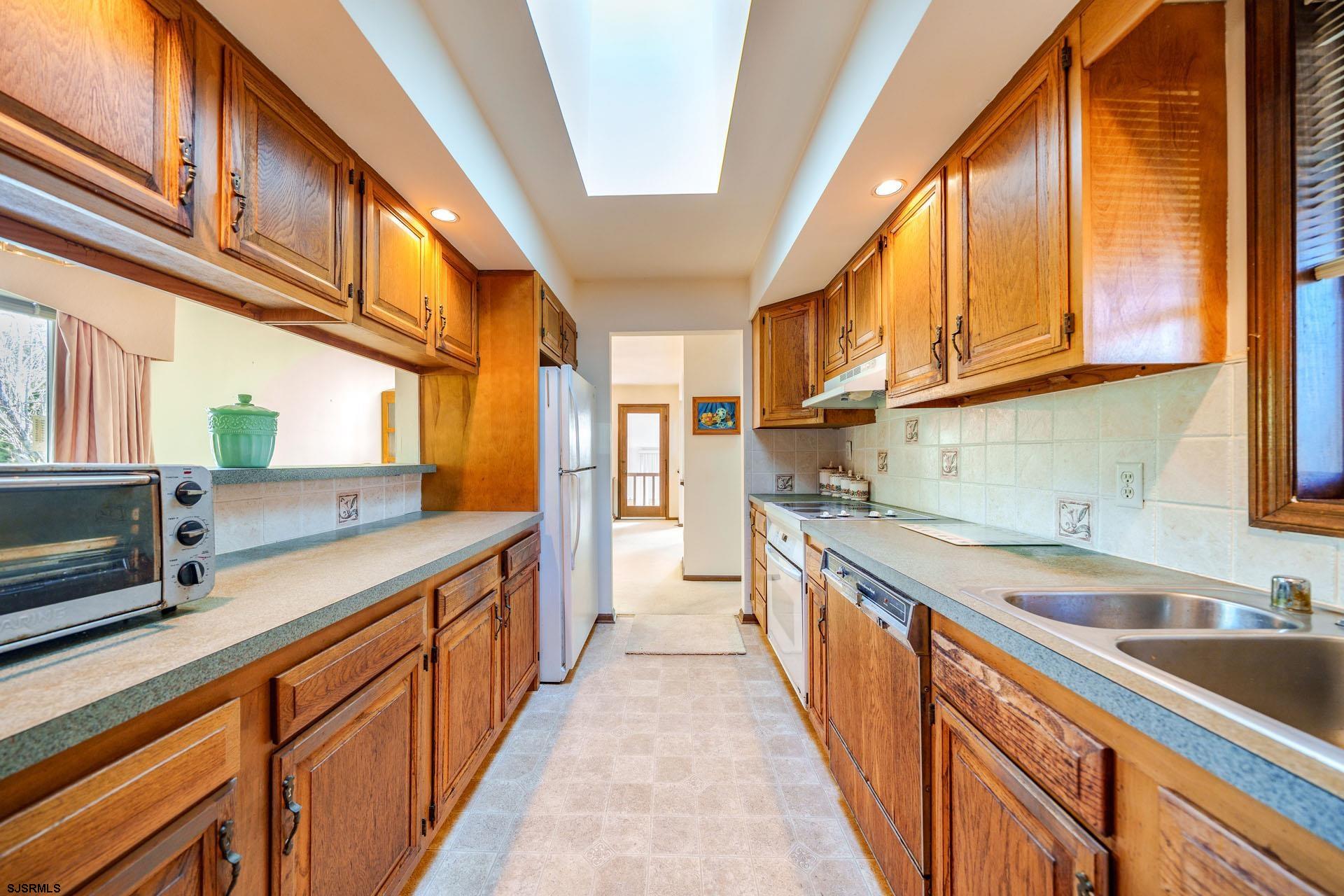 601 2nd Avenue Marmora, NJ 08223 - Photo 3 of 31 a kitchen with stainless steel appliances granite countertop a sink and a cabinets