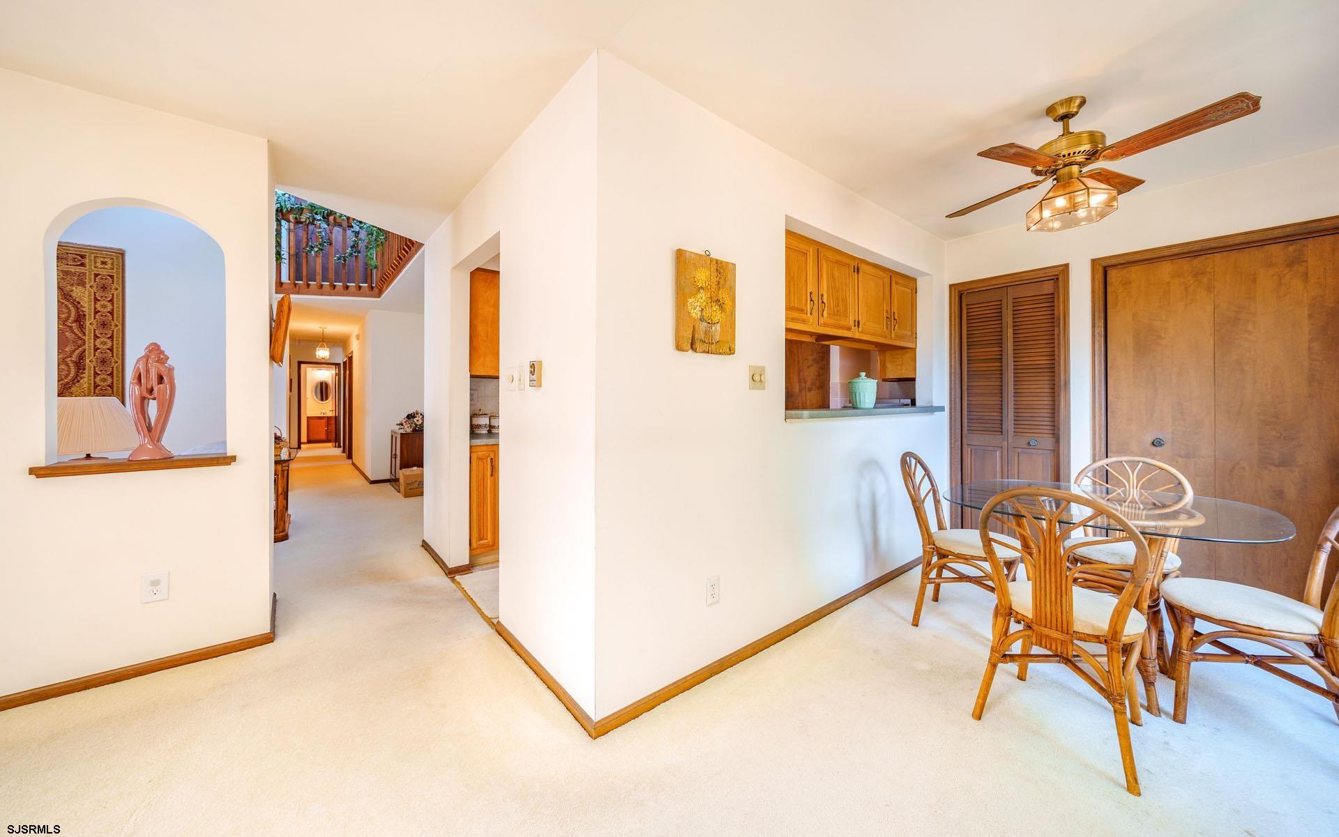 601 2nd Avenue Marmora, NJ 08223 - Photo 8 of 31 a view of a livingroom with furniture and a chandelier fan